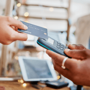 Customer using tap-to-pay with credit card.