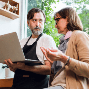 Small business owners discussing Stripe review.